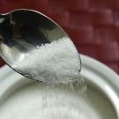 Sugar on a spoon. 