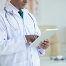 doctor on tablet