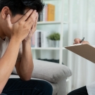 Man with health care professional 