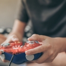 kid playing video game