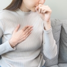 woman coughing
