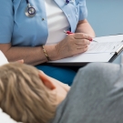 A sick child lying on his side