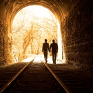 man and woman walking 