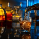 whiskey poured into a glass