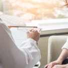 doctor speaking with patient