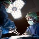 Surgeons performing a procedure
