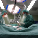 Surgeons performing a procedure