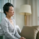 woman in a room alone