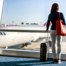 woman with bags traveling at the airport 