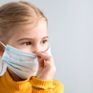 Child wearing a mask