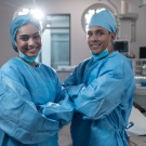 female and male surgeon standing side by side