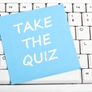 sticky note that reads "take the quiz"