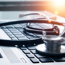 stethoscope on computer