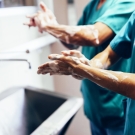 physicians washing hands before procedure