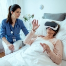woman using VR glasses in doctors office