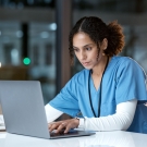 doctor at her computer