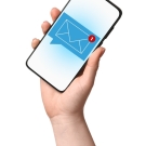 hand with cell phone