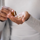 Woman taking pills