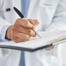 doctor taking notes