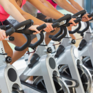 WOMEN USING STATIONARY BIKES