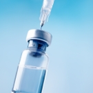 vaccine vial and needle
