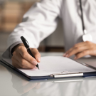 Physician writing