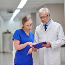 physicians looking at chart