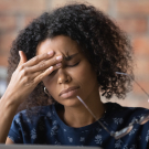 Woman with migraine