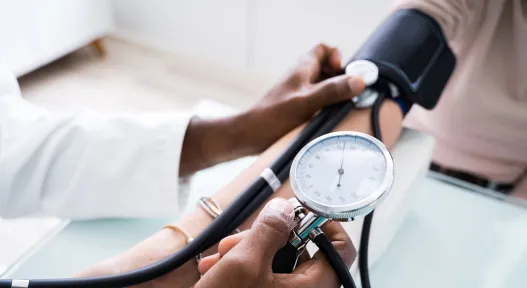 doc taking blood pressure