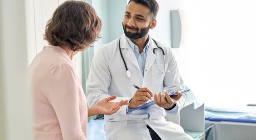 doctor talking to patient