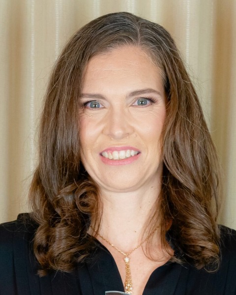 Dr. Millie Long, Co-Chair, AIBD