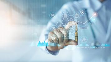 Stock image of person holding pills behind a graph
