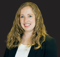 A headshot photograph of Emma Bijesse.