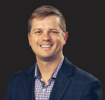 A headshot photograph of Daniel Buchenberger.