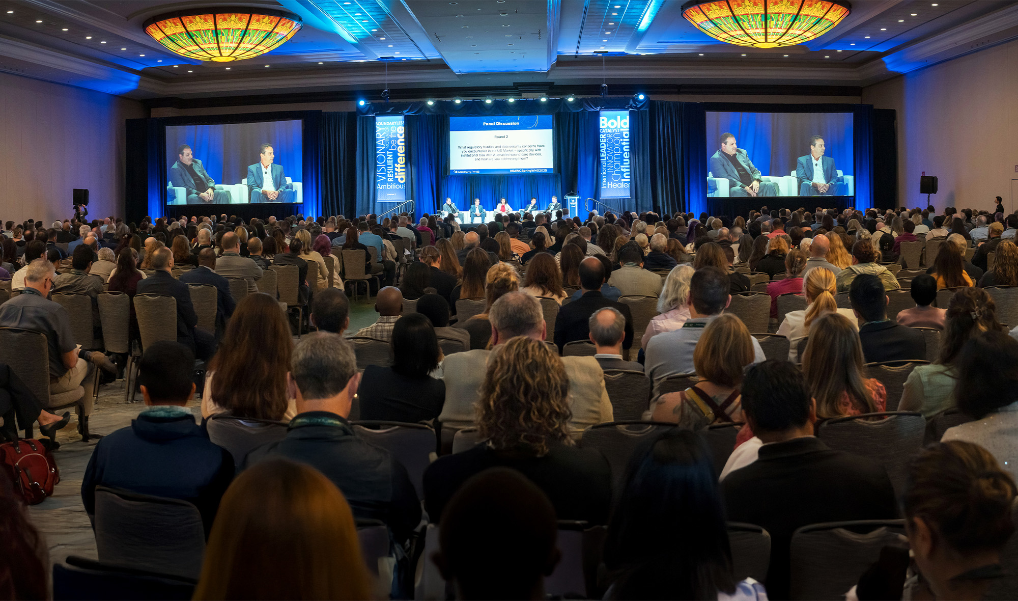 Attendees in the crowd at SAWC Spring | WHS, participating in multidisciplinary wound care education.