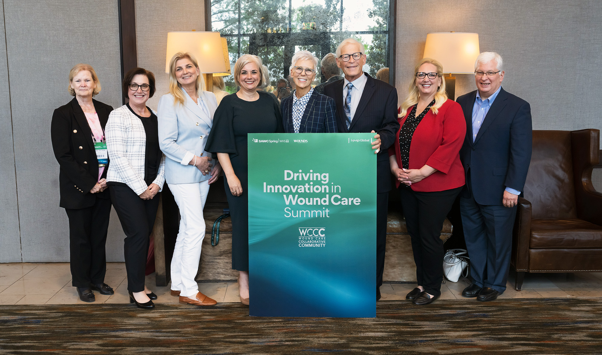 Group photo of expert faculty at the Wound Care Collaborative Community Driving Innovation Summit at SAWC Spring | WHS, uniting FDA, CMS, and wound care leaders.