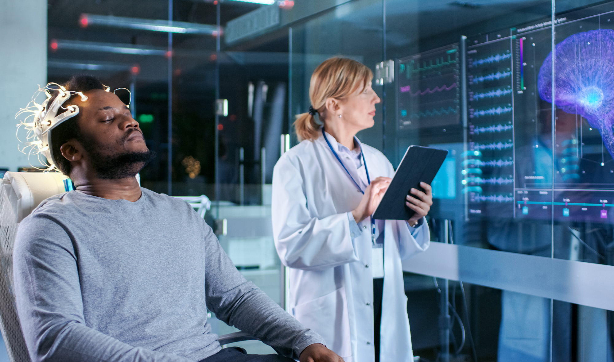 Doctor assessing sleep study with patient