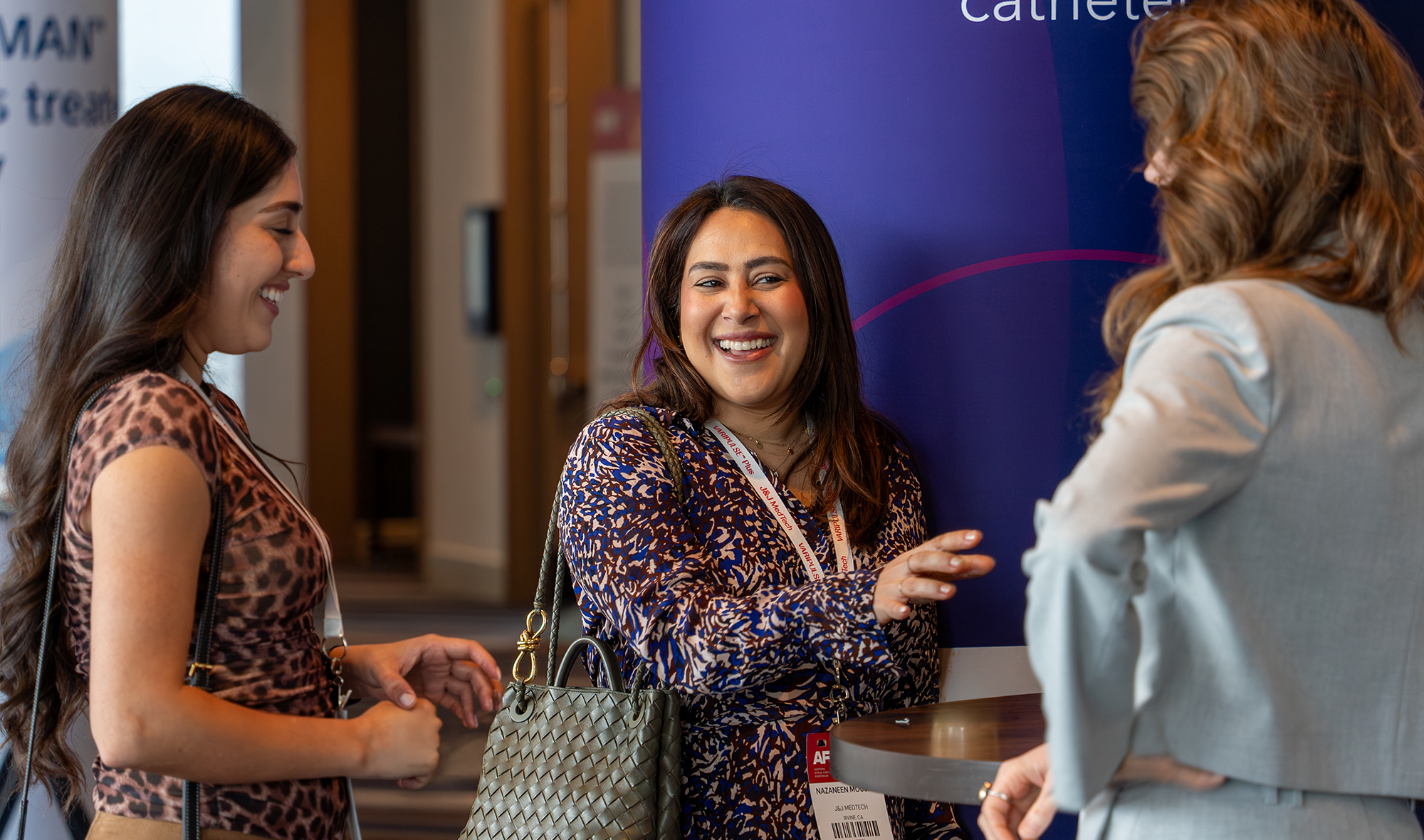 Attendees smiling in a group