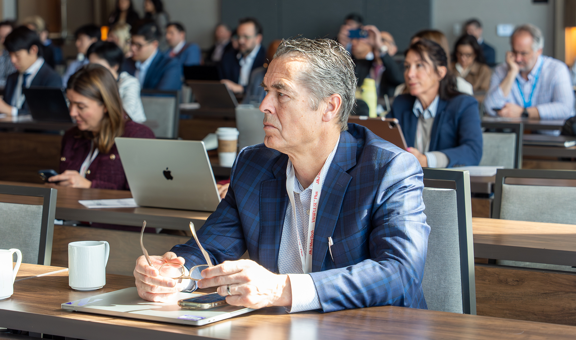 Conference attendee observing session