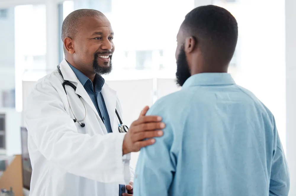 Doctor talking to patient