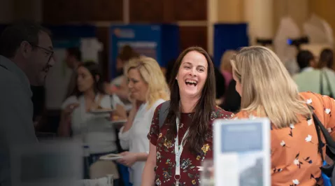 Group of Conference Attendees laughing