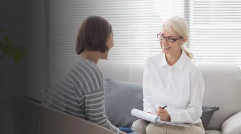 A stock image of a mental health provider with a patient.
