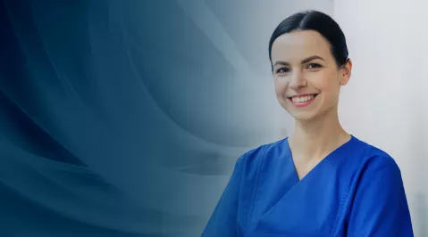 Healthcare worker in blue scrubs