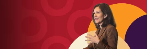 Dr. Roboz speaking at the podium at LL&M Congress