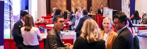 Attendees networking in exhibit hall