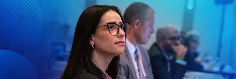 Blue Background with APPS listening intently to a speaker