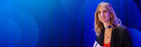 Faculty speaking to attendees