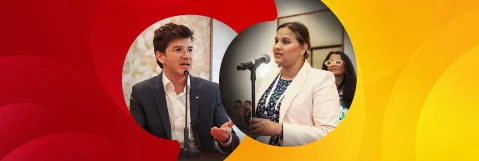 Two oncology experts engaged in discussion on stage at LL&M Great Debates.