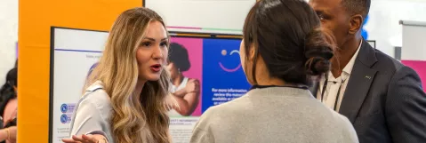 Attendees Networking in Exhibit Hall