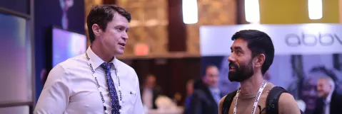 Attendees networking in exhibit hall